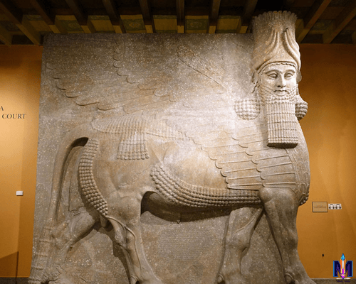 Ancient Lamassu-style sculpture with a lion’s body and human head, symbolizing protection and blending Near Eastern and Chinese artistic influences